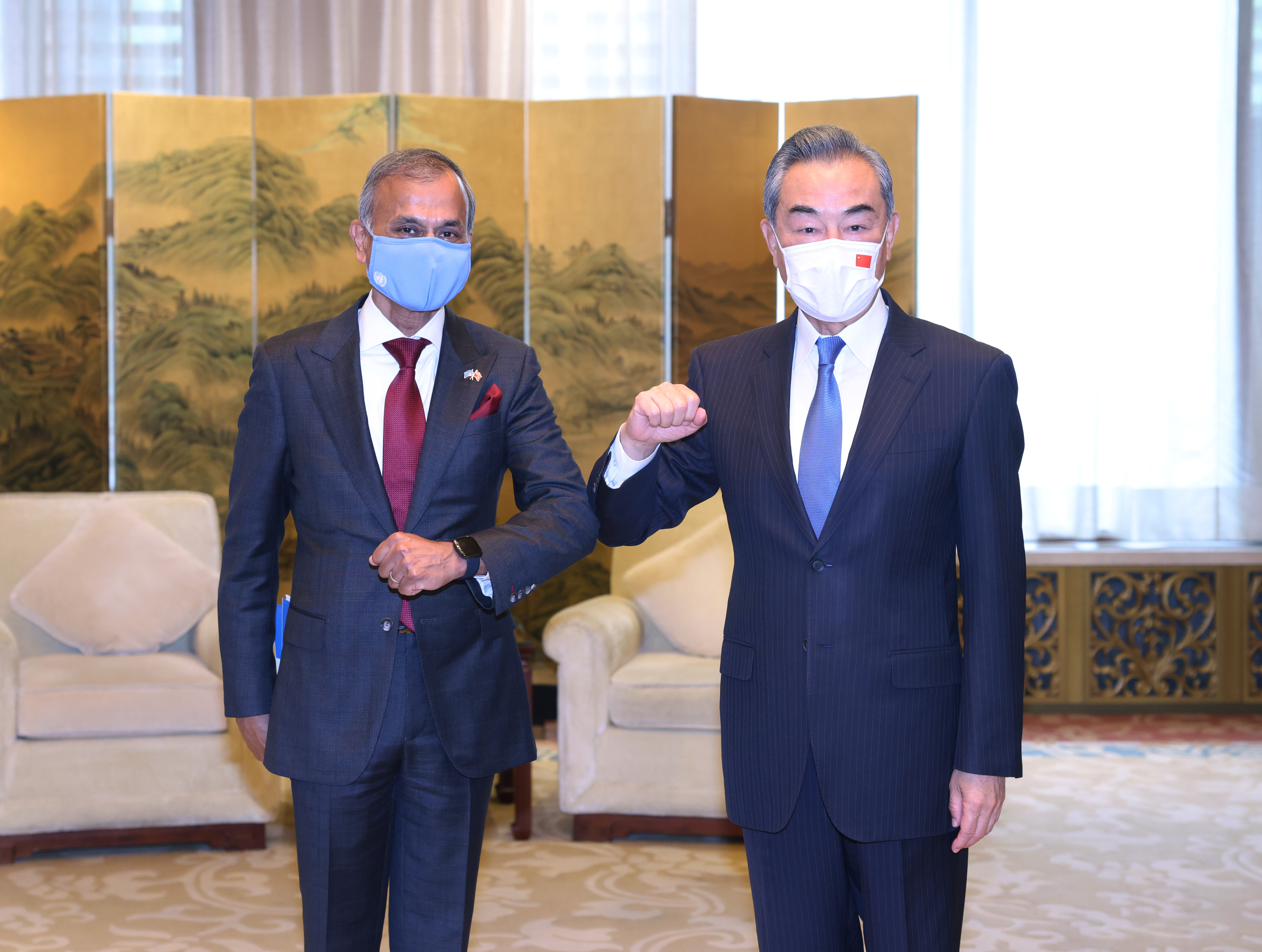 UN Resident Coordinator Siddharth Chatterjee with State Councilor and Foreign Minister Wang Yi