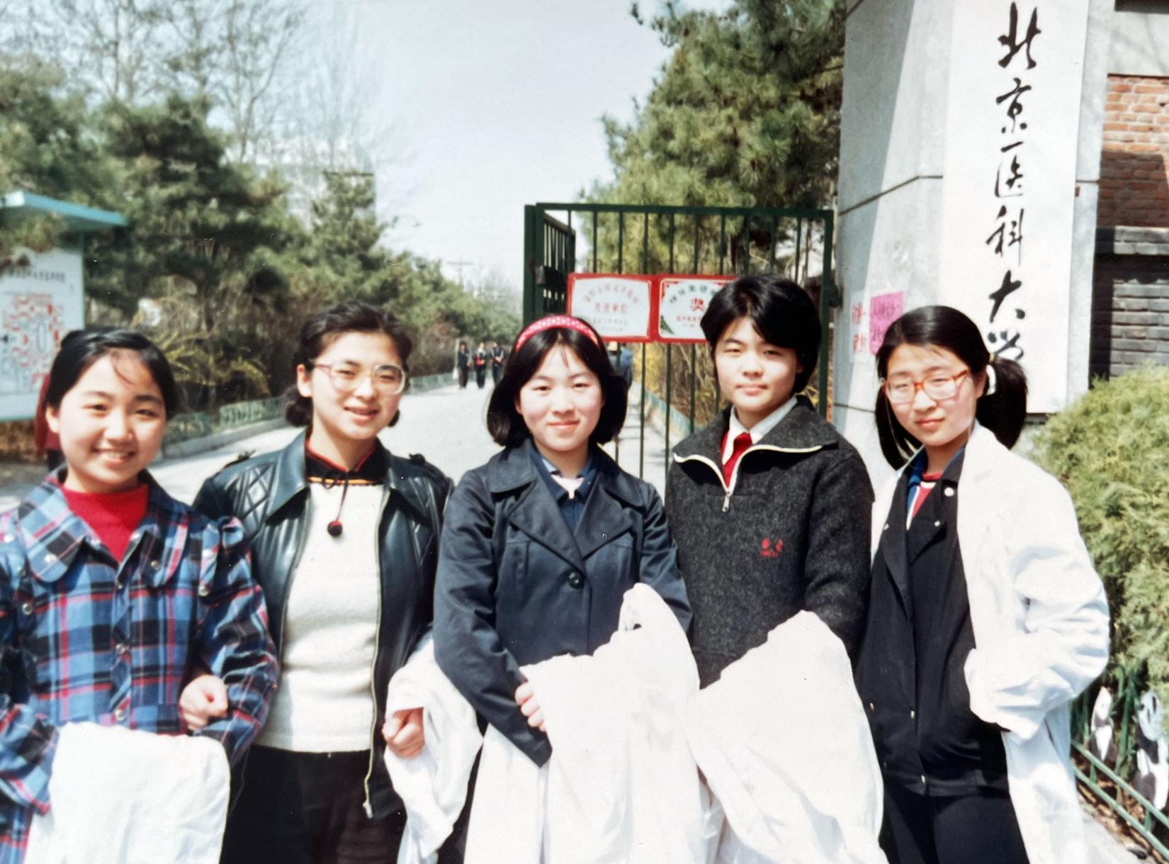 Dr. Zhou Kai (center) at Beijing Medical University