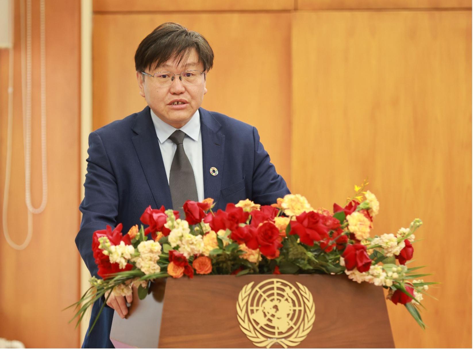 Wang Xiaolin, Deputy Dean of Institute for Six-Sector Economy, Fudan University, delivers a speech at the seminar. [Photo by Dong Ning/China.org.cn]