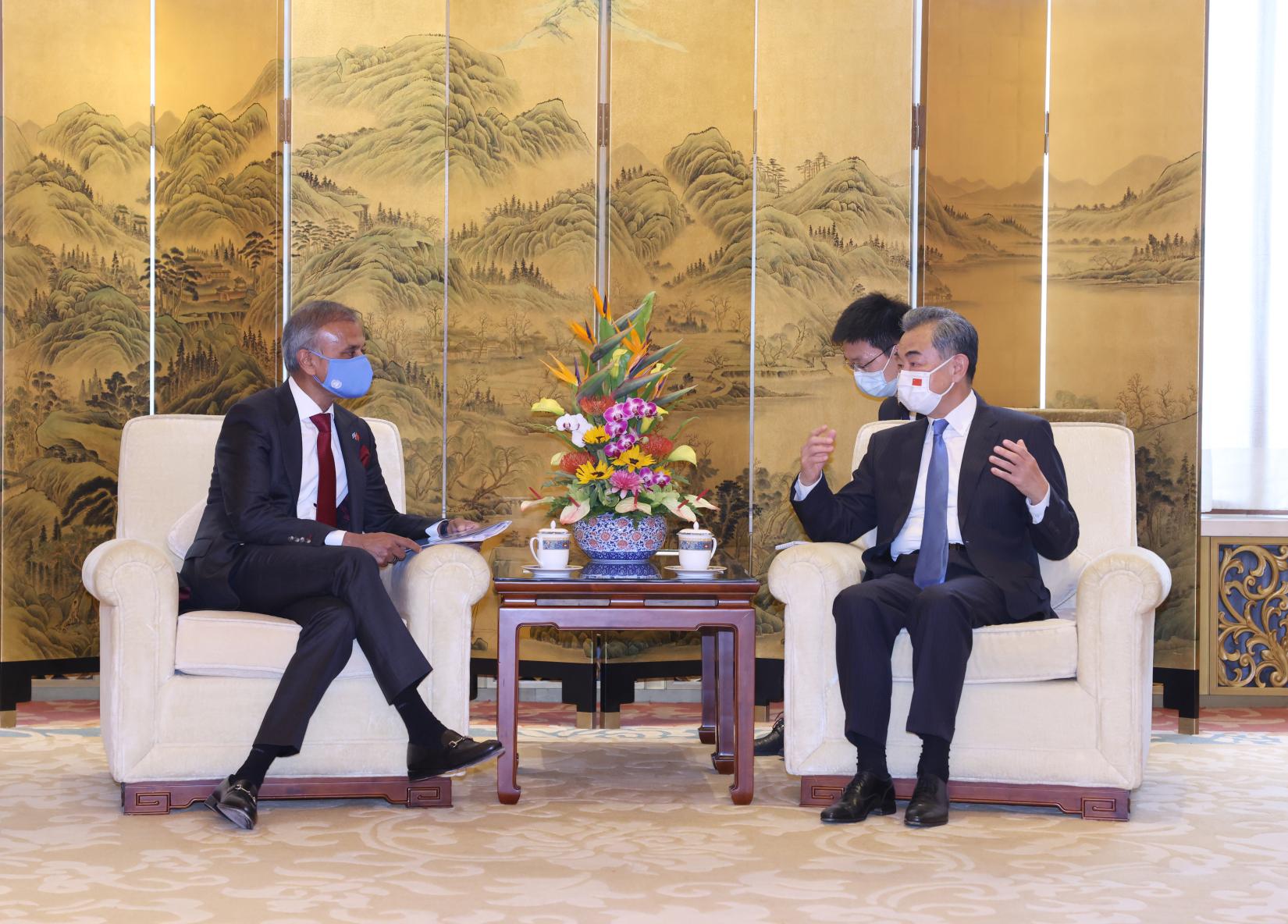 UN Resident Coordinator Siddharth Chatterjee with State Councilor and Foreign Minister Wang Yi