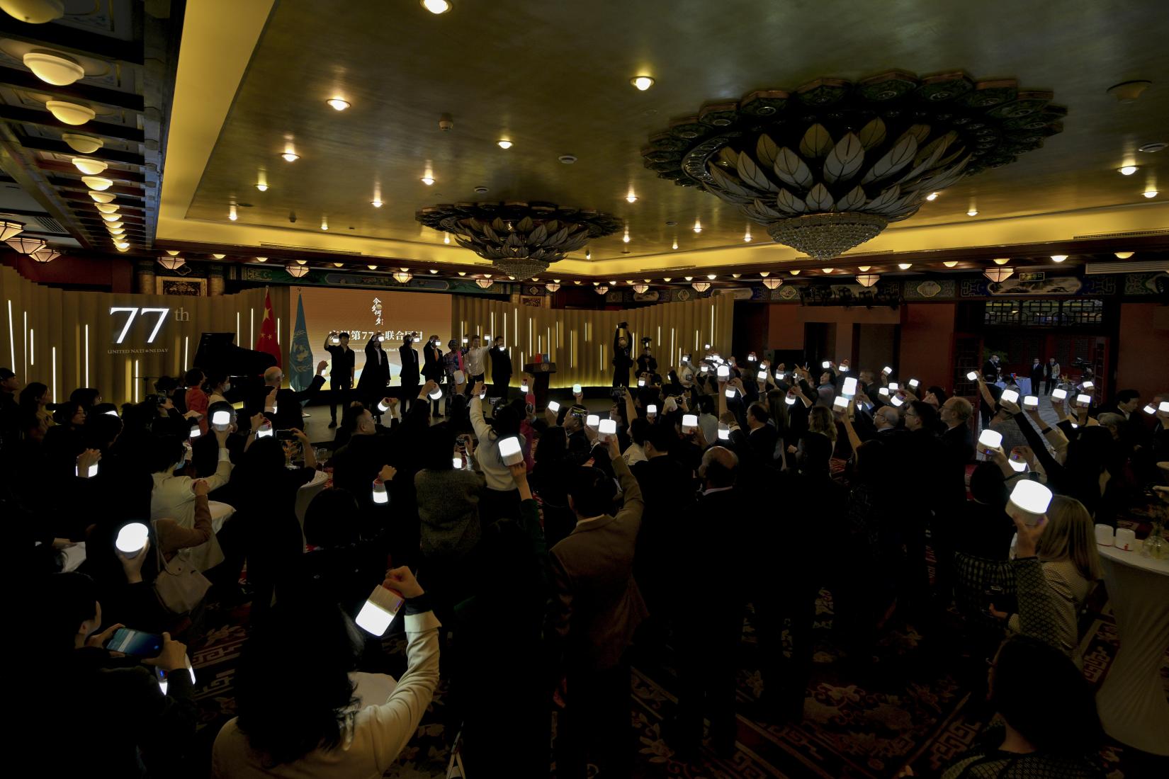 Guests at UN Day ceremony raising a "beacon of hope"