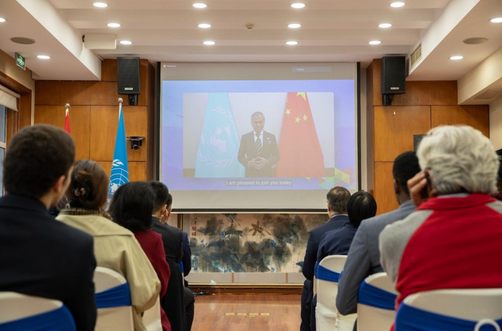 A pre-recorded video of a speech delivered by Siddharth Chatterjee, UN resident coordinator in China, is played during the opening ceremony of the International Forum on Sci-Tech Empowering Rural Transformation - 2nd Event. (Photo by Yang Jia/China.org.cn)