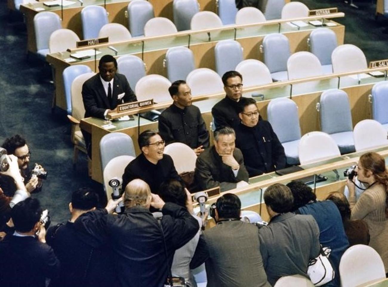 Delegation of the People's Republic of China is seen taking seats for the first time at the UN Assembly Hall in the UN headquarters in New York, U.S., October 1971