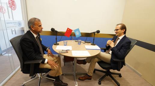 Caption: UN Resident Coordinator in China Siddharth Chatterjee sits down with Giuseppe Crocetti, the Chief of Mission in China and Mongolia for the International Organization for Migration (IOM)